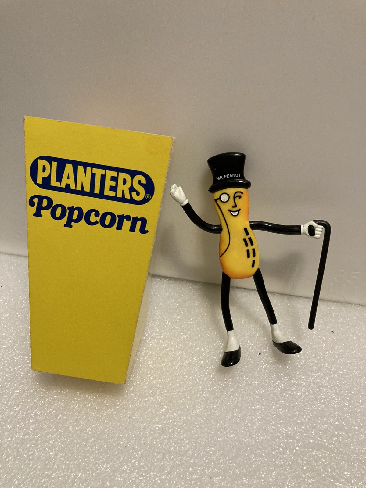 MR. PEANUT MASCOT BENDABLE ACTION FIGURE WITH PLANTERS PEANUT POPCORN PAIL.
