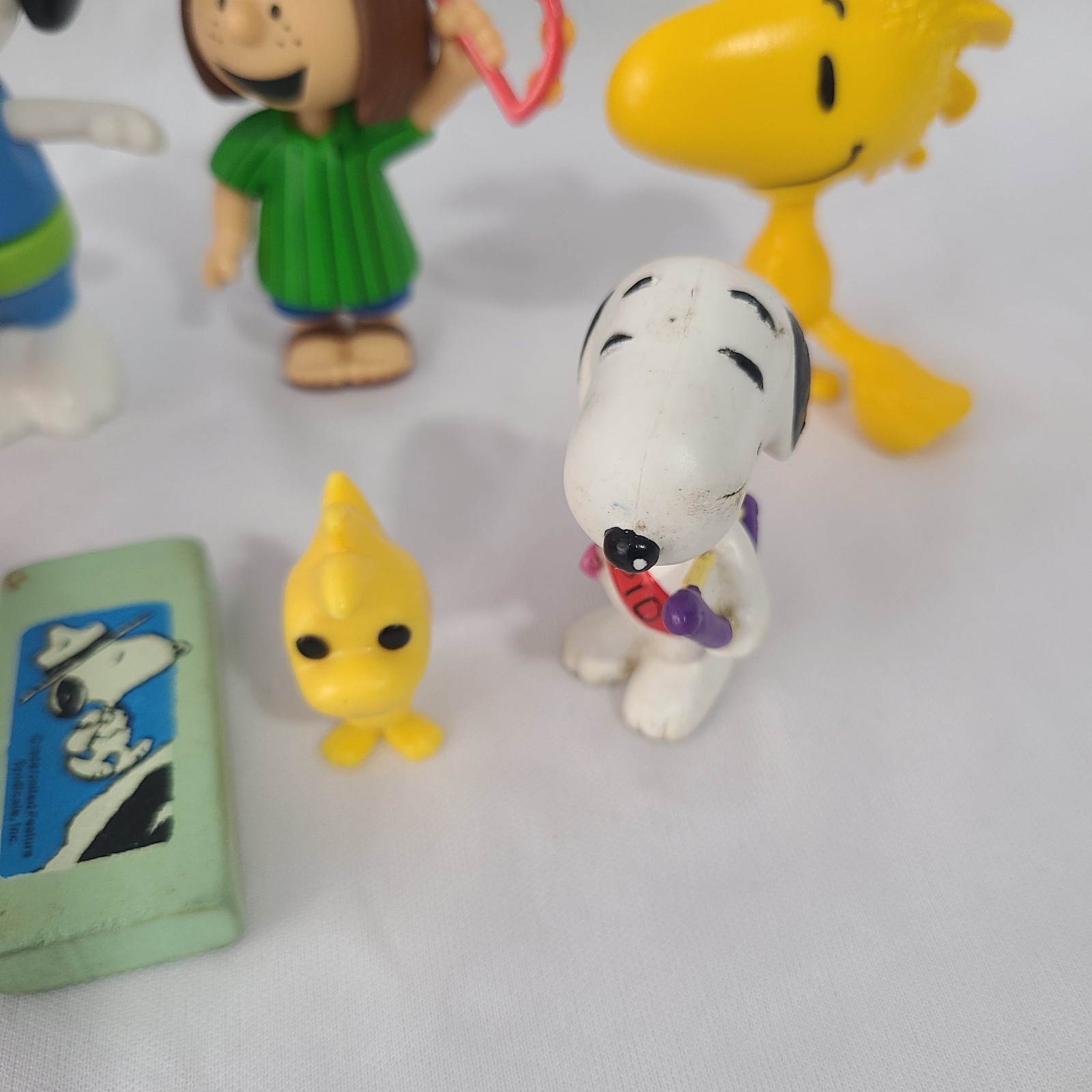 9 Piece Lot Of Peanuts Toys Figures Snoopy Woodstick Peppermint Patty Collection