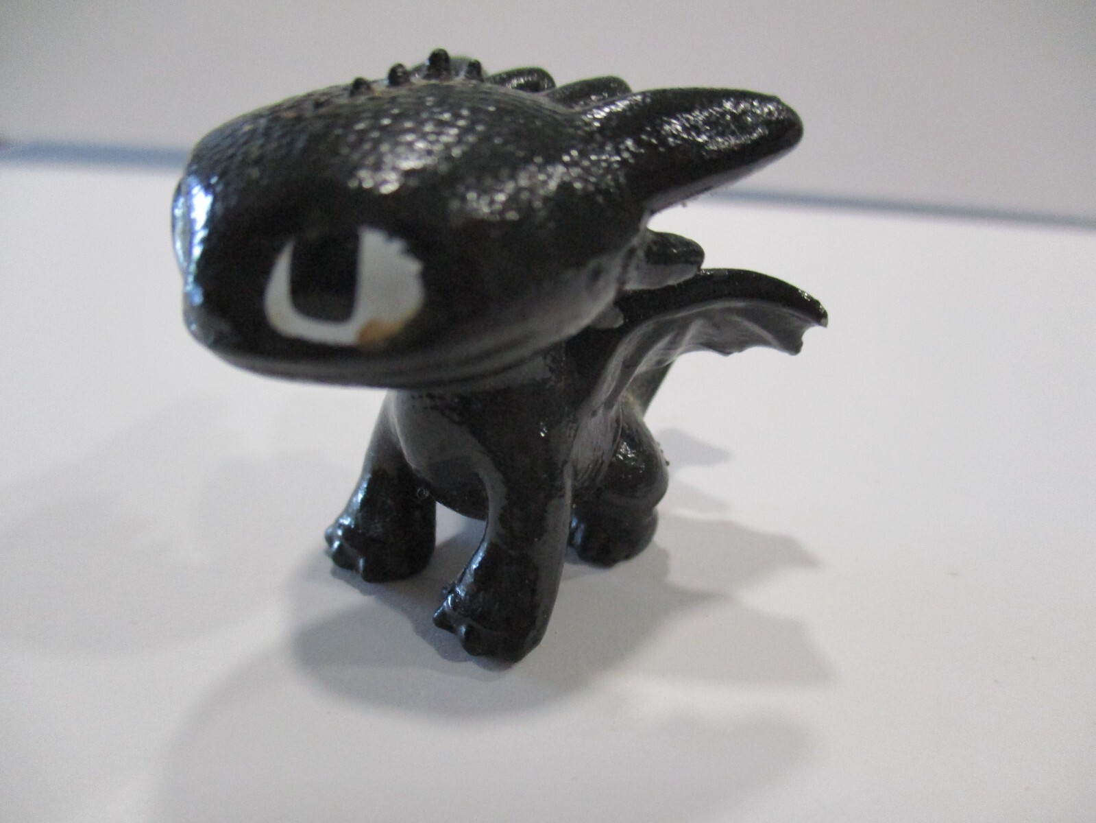 2015 D.W.A. LLC DREAMWORKS ANIMATION HOW TO TRAIN A DROGON MINI BLACK DRAGON