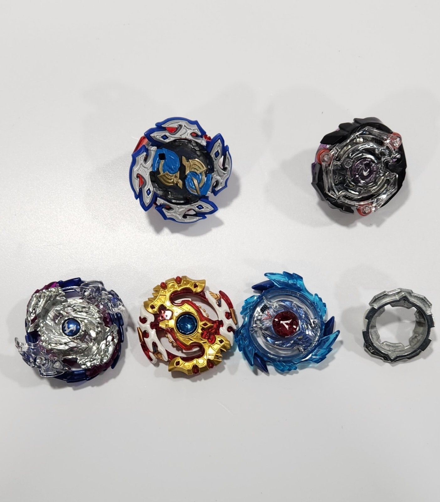 Beyblade Lot of 4 And Parts Please see Pictures Added More Parts.