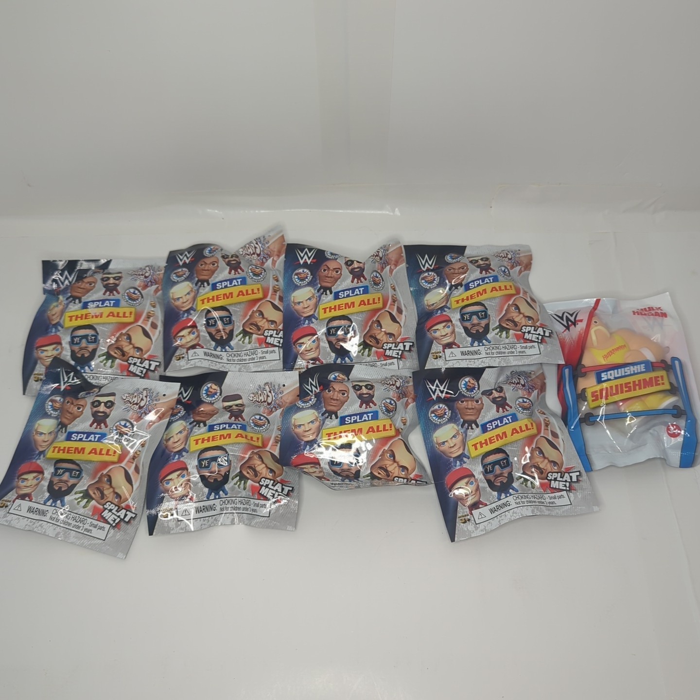 9 NEW WWE Splats Head Blind Bags And Hulk Hogan Squishie Squishme!