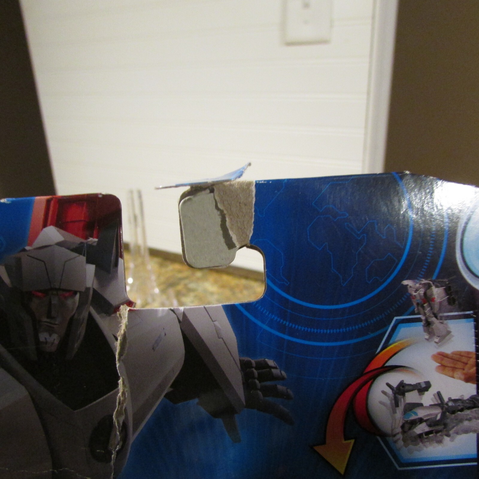 Transformers Earthspark 1 Step Flip – Megatron cardstock damaged