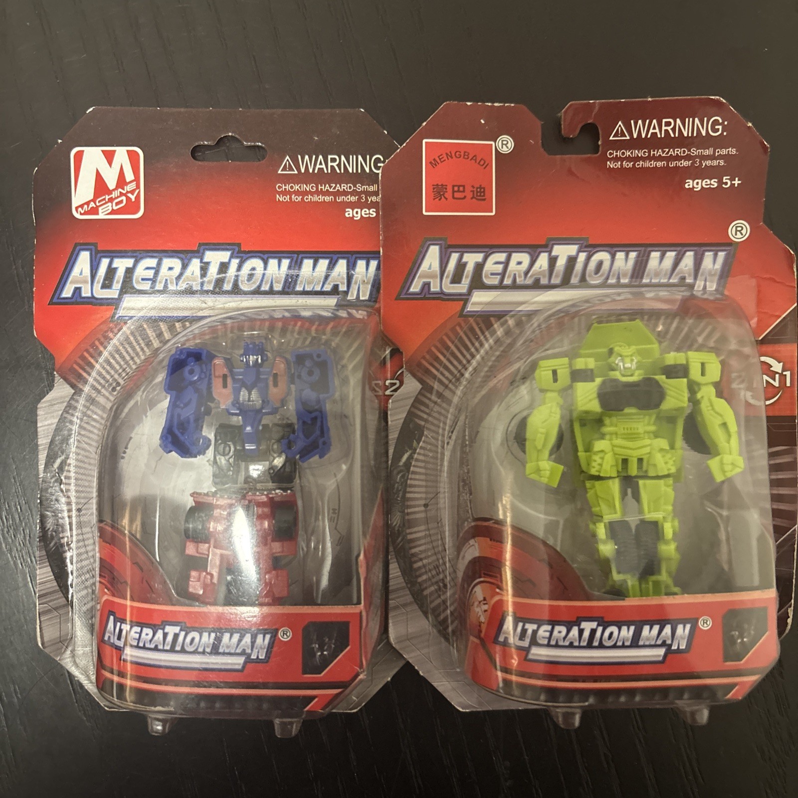 Lot of 2 AlteraTion Man Transformer Figurines SEALED AGES 5 AND UP