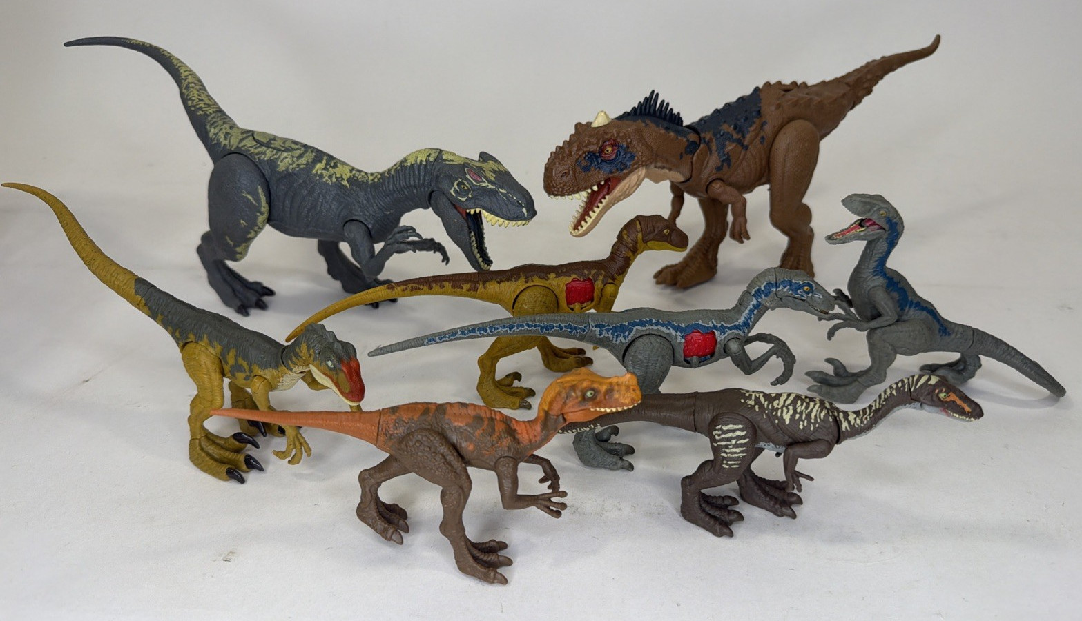 Lot of 8 Jurassic World Toy Dinosaurs Opposable Raptor Dinosaurs