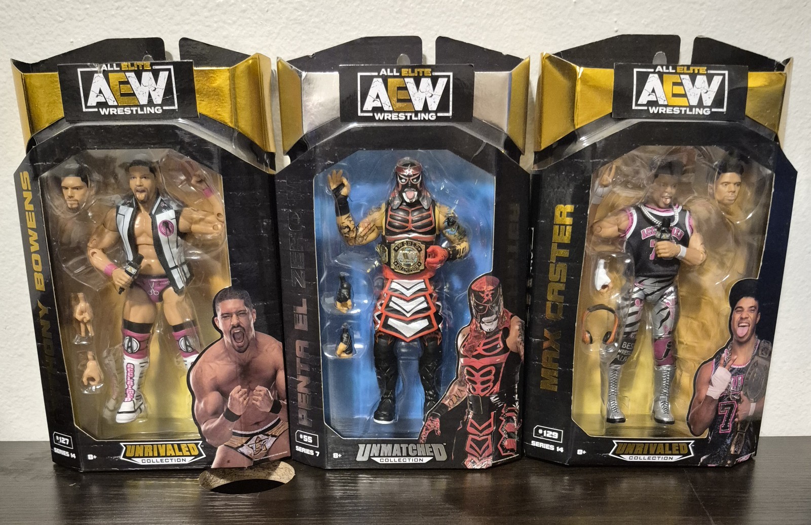 3 All Elite Wrestling Figures.
