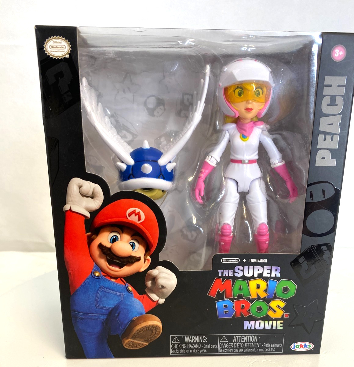 Super Mario Bros Movie Racing Princess Peach 5 inch Action Figure & Blue Shell