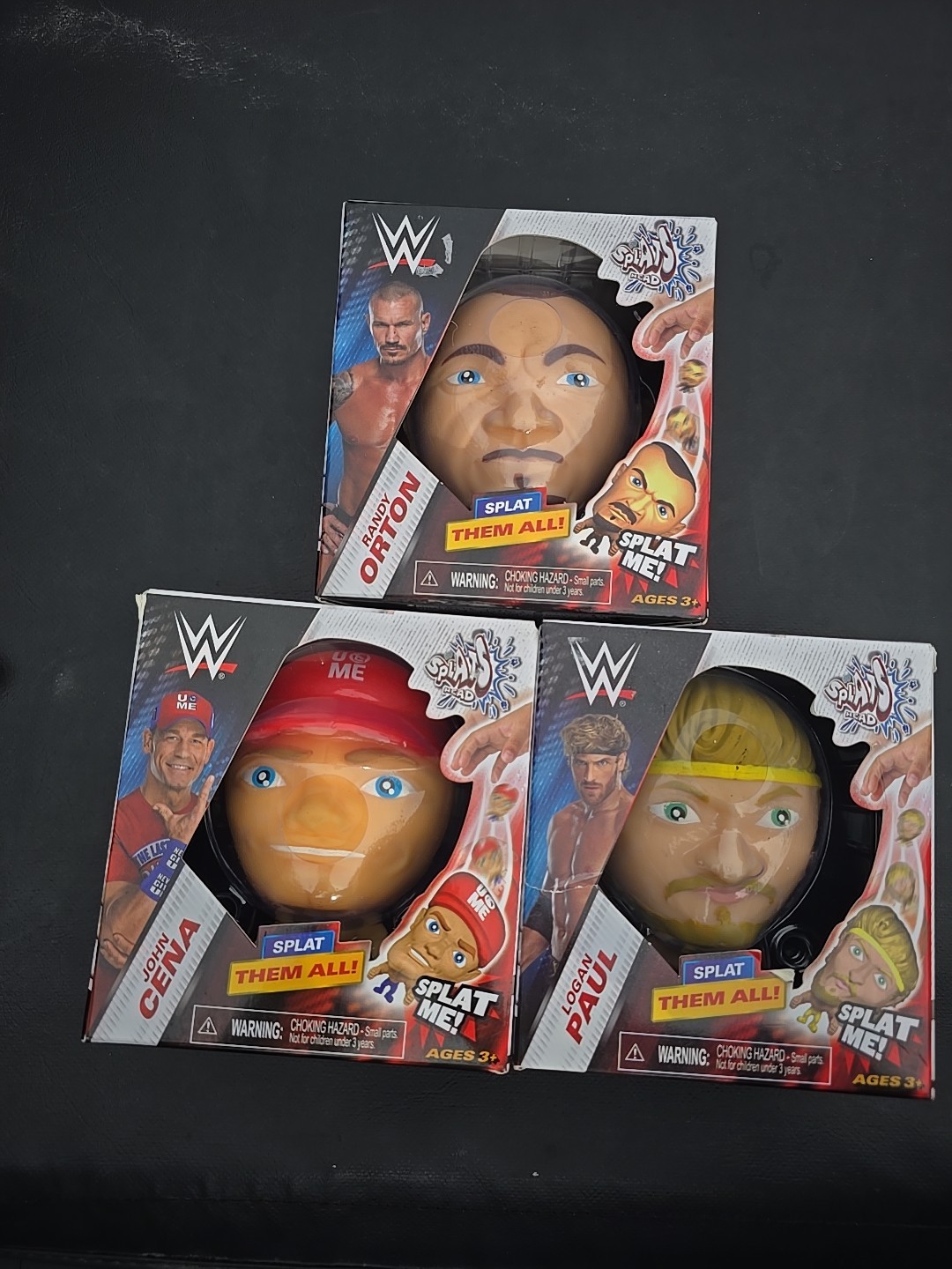 WWE Splat Head Figure 3 Pack Set – John Cena, Logan Paul, Randy Orton Brand New