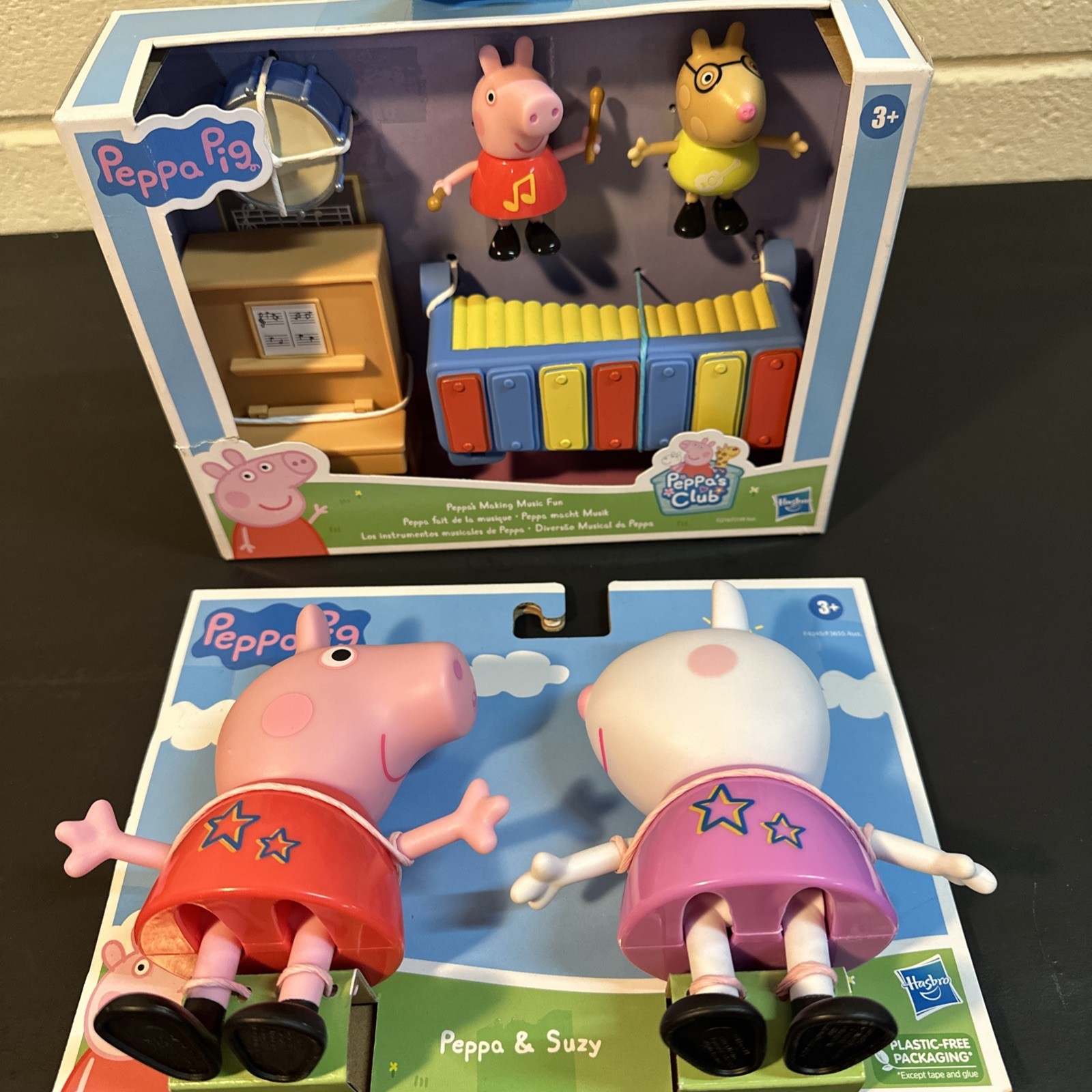 Lot of 2 Peppa Pg Toys, Peppa & Suzy with an entire musical set up piano drums..