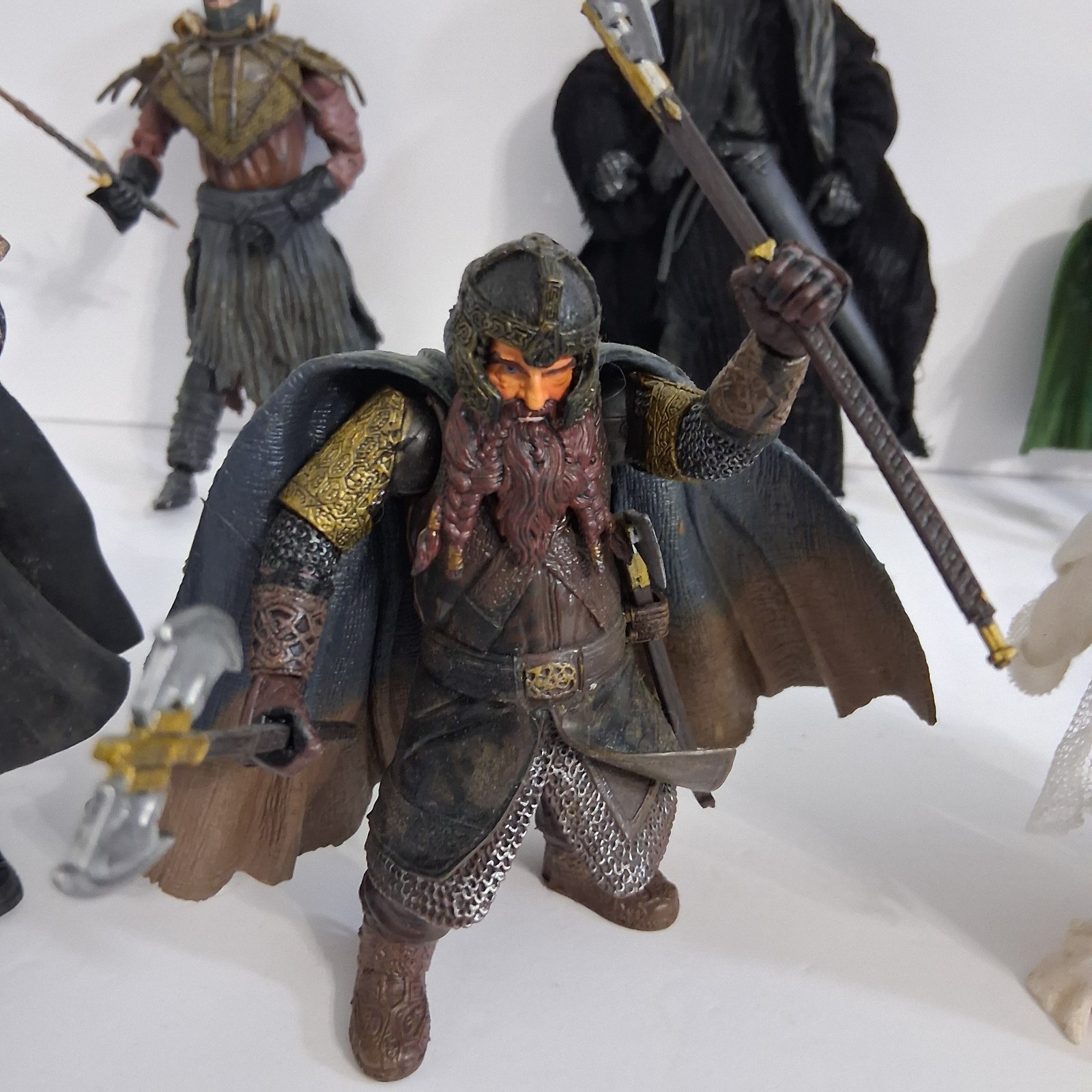 Lord Of The Rings Toy Figure Lot Of 9 In LOTR Lunch Box With Random Weapons READ